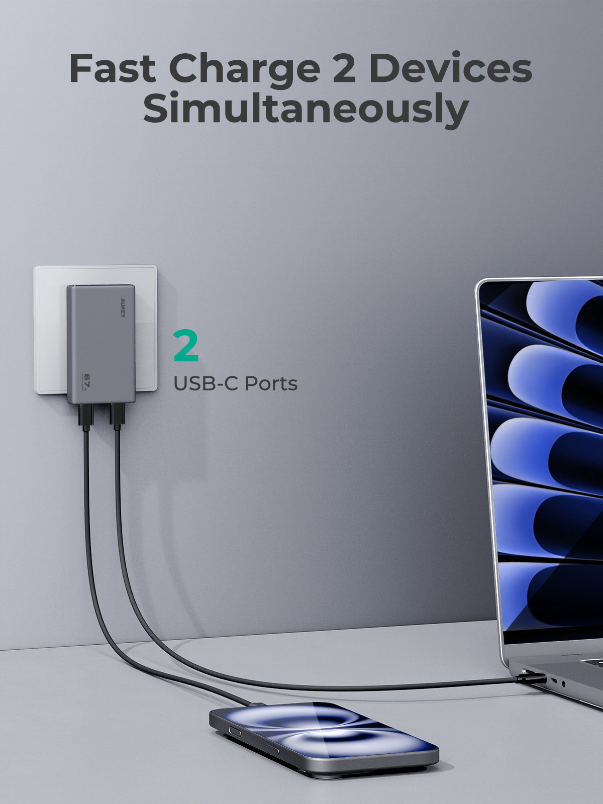 AUKEY PA-C4 Comet Slim 67W PD Wall Charger with two USB-C ports charging smartphone and laptop simultaneously