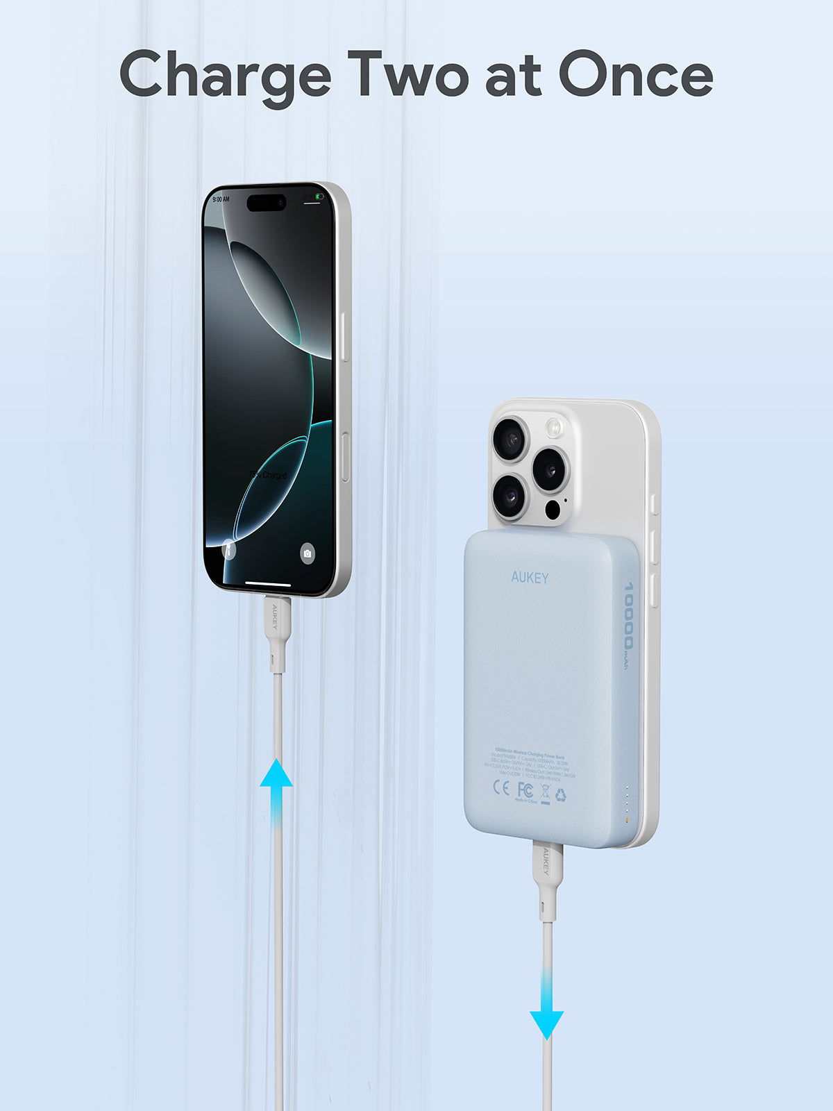 AUKEY MagFusion 10000mAh power bank charging two phones simultaneously with magnetic wireless and wired connections