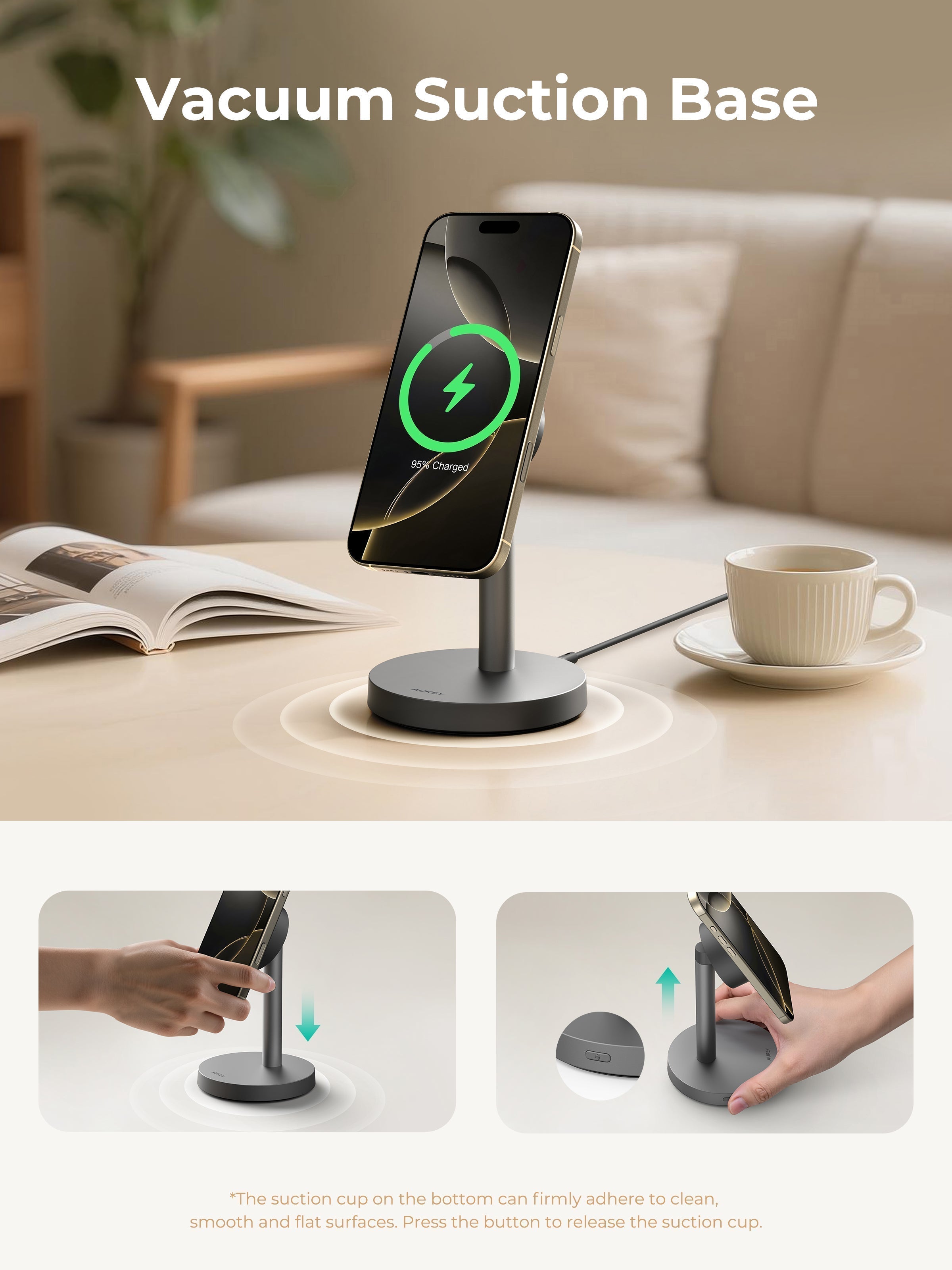 AUKEY LC-MC111 MagFusion magnetic Wireless Charger with vacuum suction base holding smartphone upright on desk next to cup and book, demonstrating wireless charging and suction cup feature