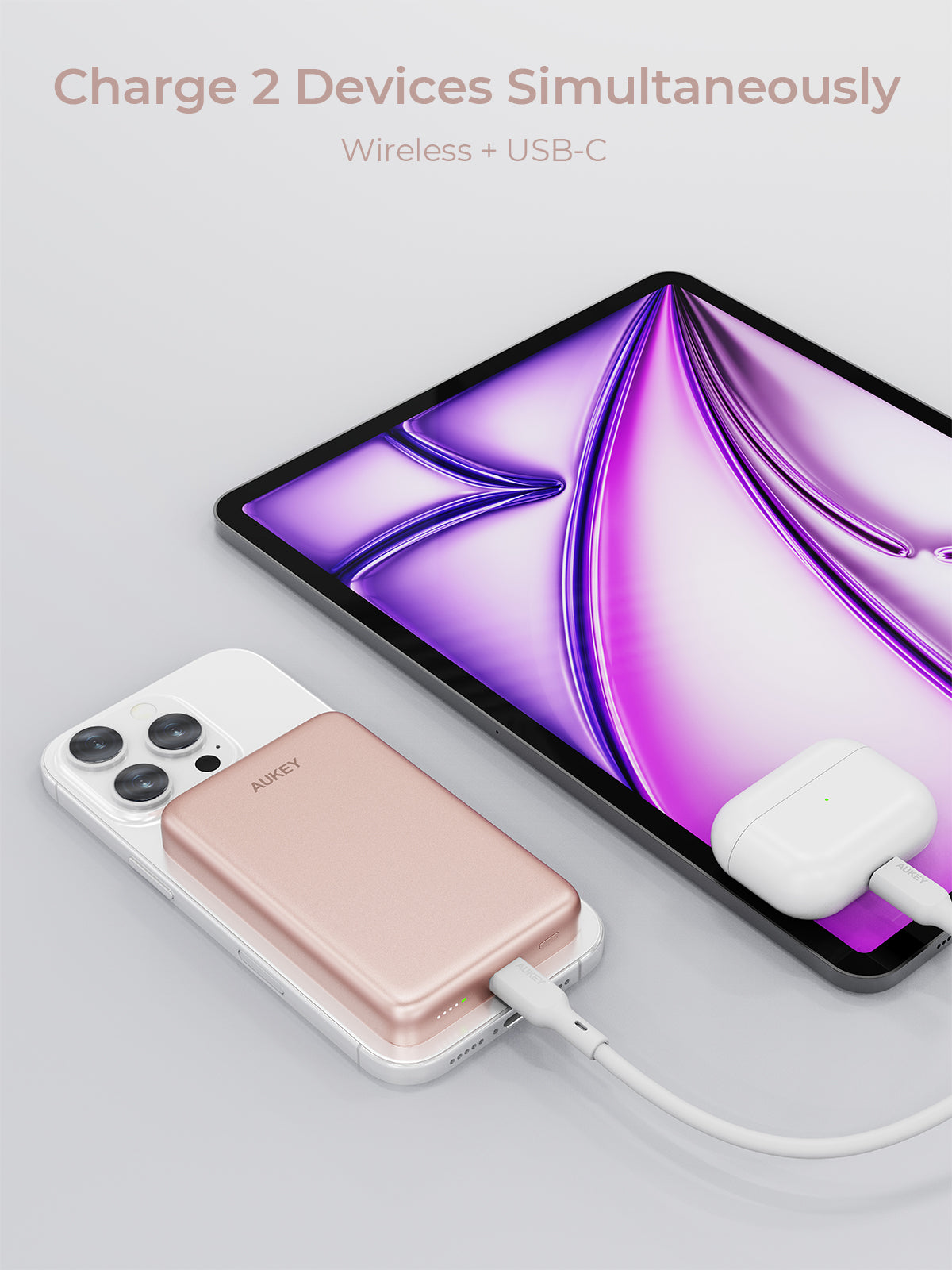 AUKEY MagFusion magnetic wireless charger power bank charging two devices simultaneously