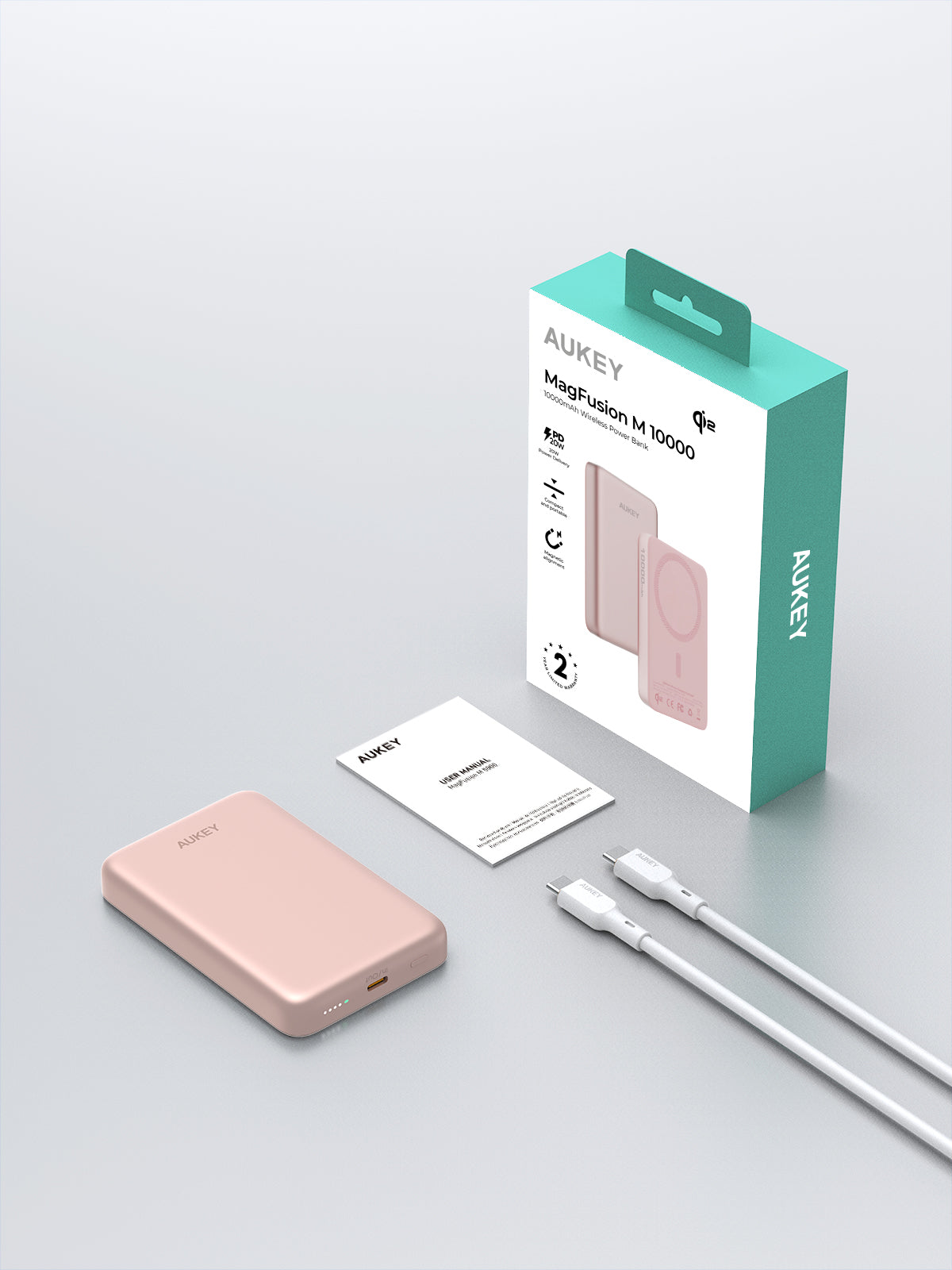 AUKEY MagFusion M 10000 20W magnetic wireless charging power bank with USB-C cable and packaging in rose gold color